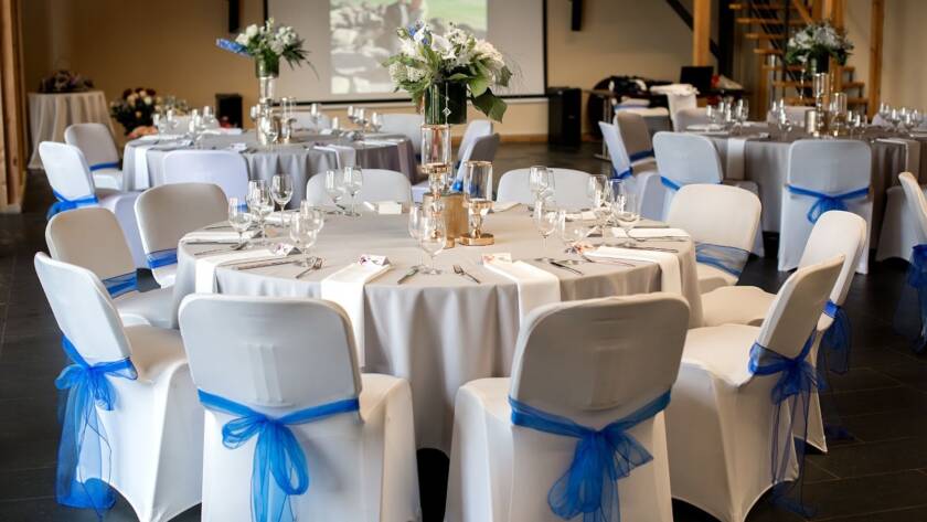 A wedding venue rental with a white and blue color theme.