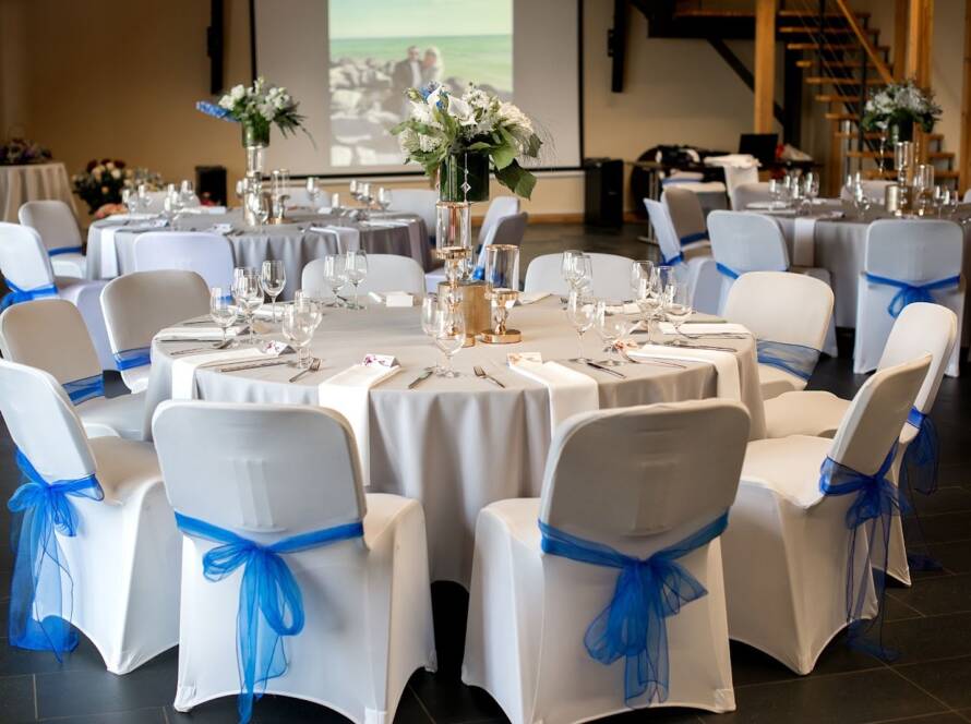 A wedding venue rental with a white and blue color theme.